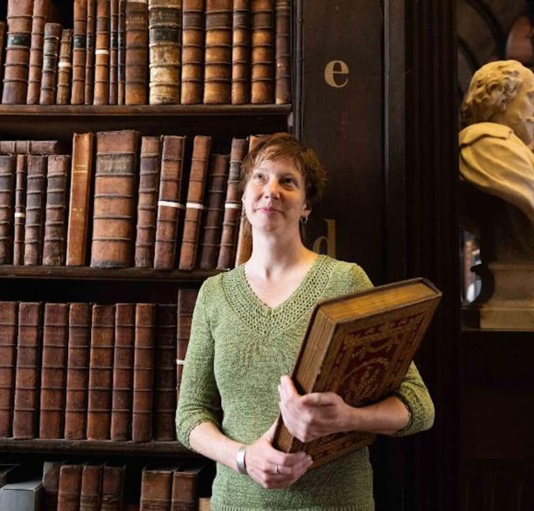 Unlocking the Fagel Collection Project Manager Ann-Marie Hansen with a copy of Jakób Breyne’s Plantarum Exoticarum Centuria Prima
